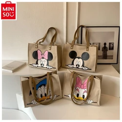 MINISO Disney sevimli karikatür Anime Donald ördek çanta kadın moda yüksek kaliteli tuval büyük kapasiteli Tote çanta