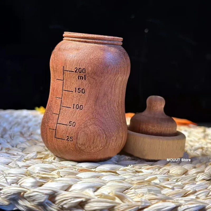 

Cute Baby Bottle Toothpick Jar 4.3" Practical Multifunctional Home Decor Ebony Carving Toothpick Box Small Storage Box fun Gift