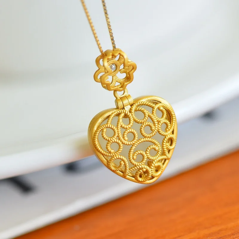 Hetian على شكل قلب طبل S925 الكيس المجوف اليشم قلادة قلادة