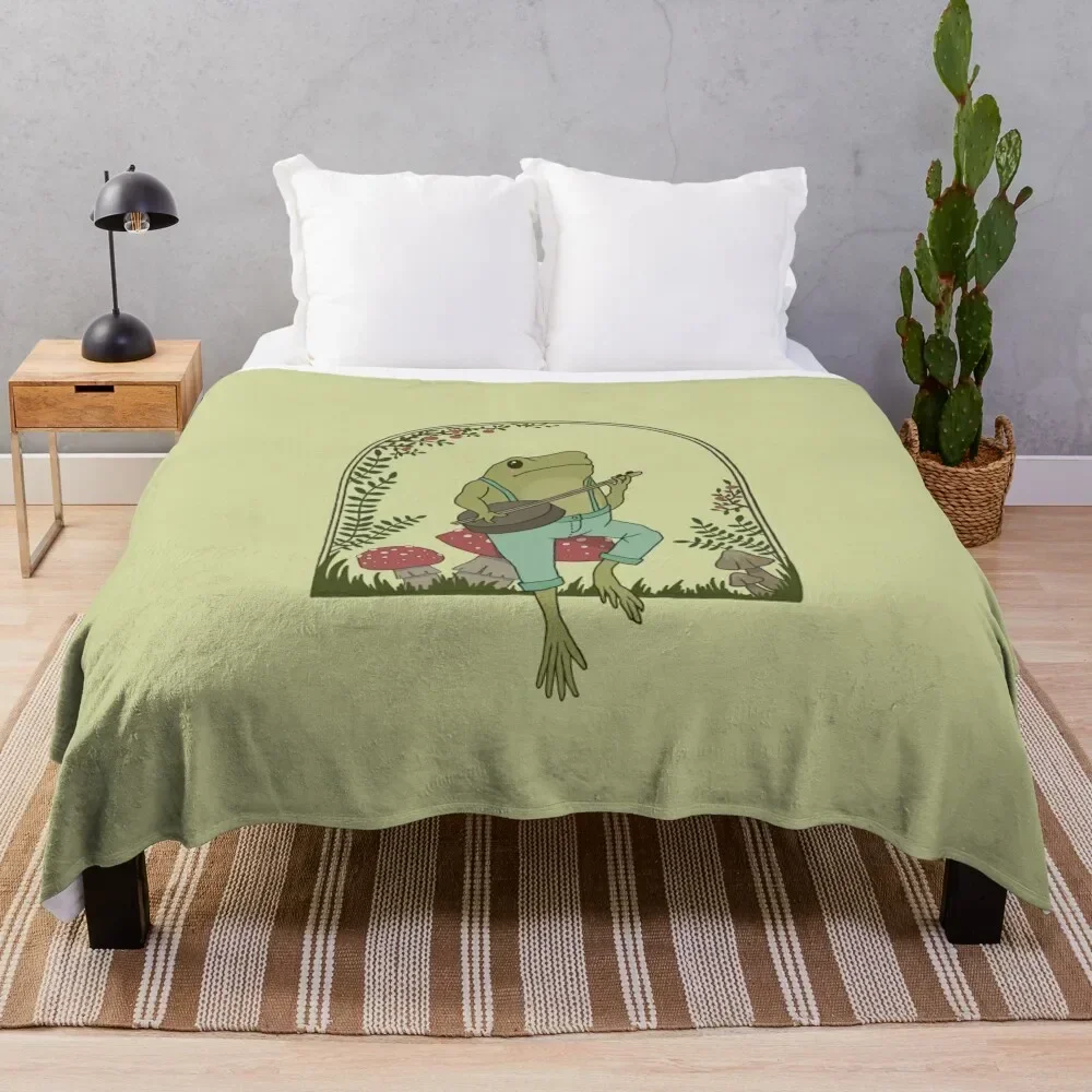 Cottagecore Aesthetic Frog Playing Banjo on Mushroom Cute Vintage - Goblincore Farmer Toad in Garden - Dark Academ Throw Blanket