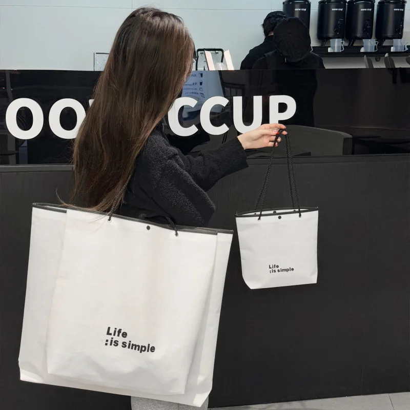 

Пользовательский. Высококачественный магазин одежды большой вместимости, нетканая сумка, упаковка для покупок, экологическая сумка для женщин