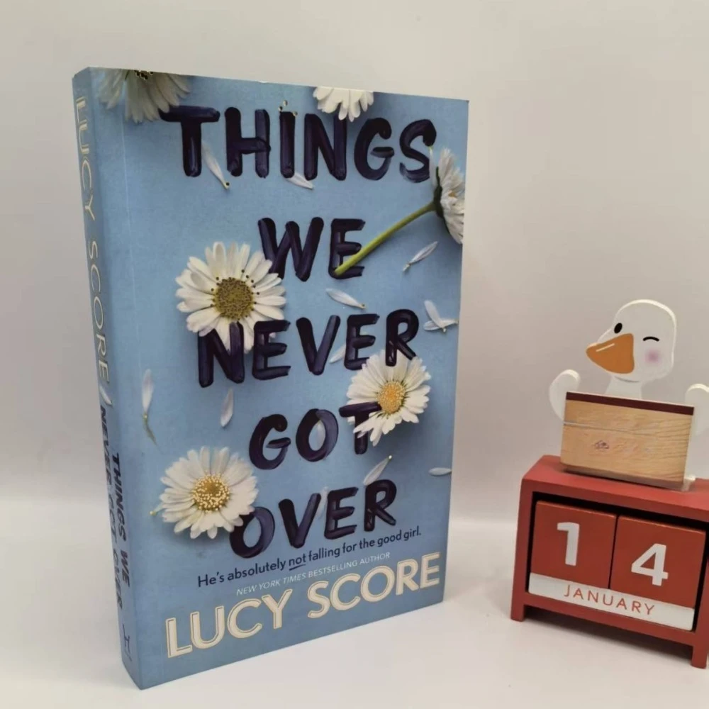 

Things We Never Got Over By Lucy Score Small-Town Romance & Healing Grumpy Sunshine Love Story Found Family Novel