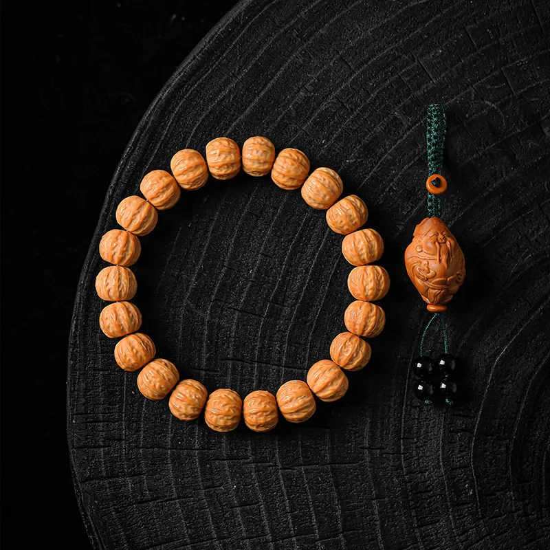 High-end carved Beijing octagonal monkey-head bracelet for men, fortune-bringing walnut   original seed beads hand-h