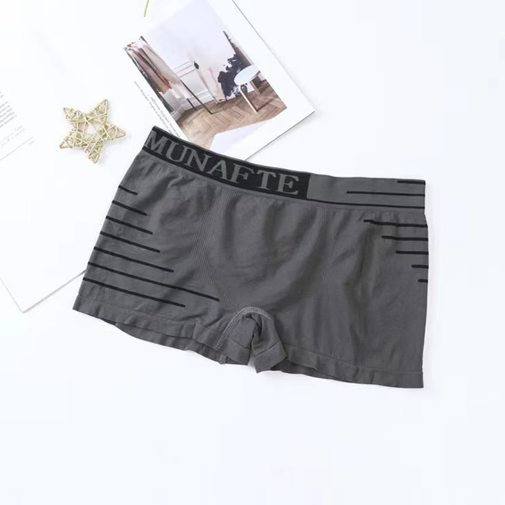 1 PC Mens Elastic Seamless Middle RISE Breathable Letter ชุดชั้นในกางเกงกางเกงขาสั้นกางเกงขาสั้นนุ่มกางเกงชาย