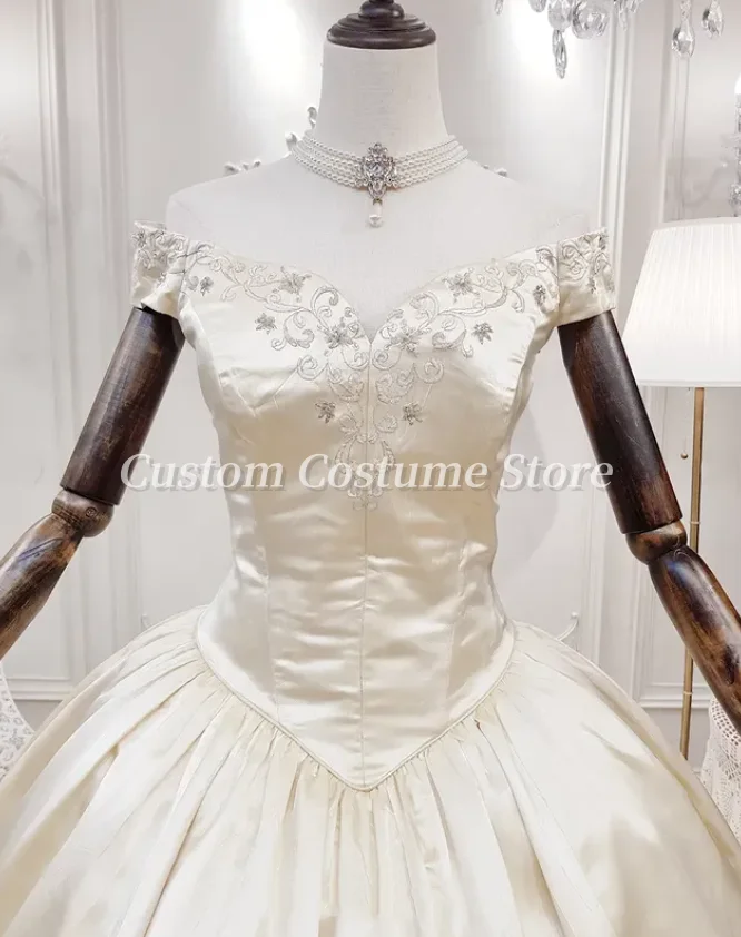 Maßgeschneiderte Vintage Champagner Prinzessin trägerlose Satin Brautkleider Blumenstickerei Vintage Ballkleider Abendkleider