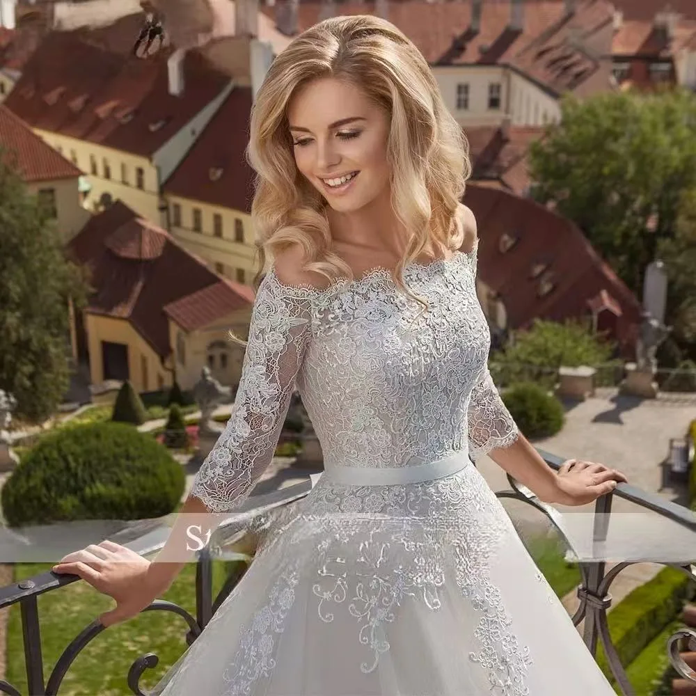 Aangepaste A-lijn gewaden boothals kant trouwjurken halve mouwen bruidsjurken met riem applicaties vestidos de novia,