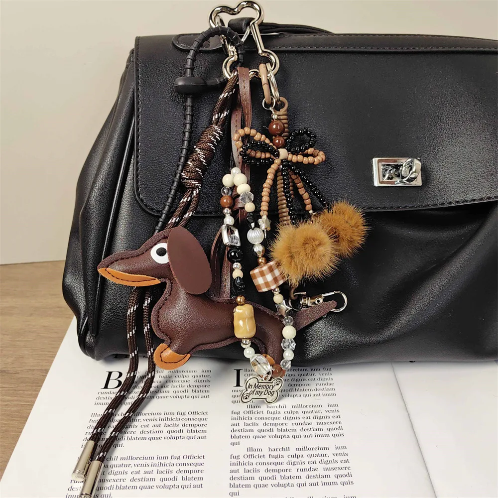 Handmade baseball personality keychain Creative simple soda bread fringe trend accessories Dachshund dog bow hairball bag pendan