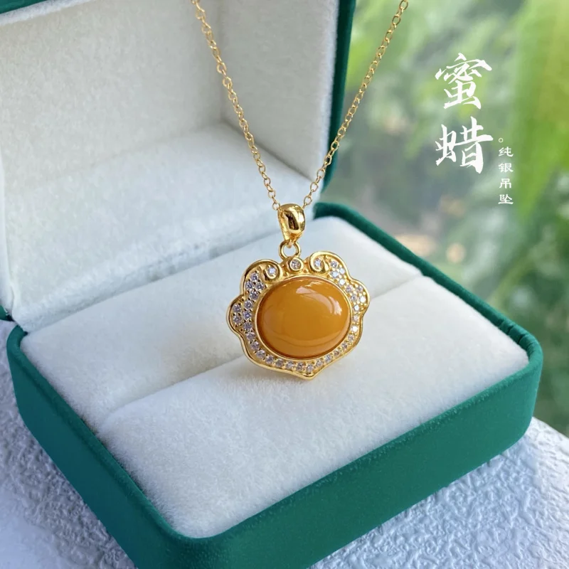 

Natural Chicken Fat Yellow Beeswax Ruyi Pendant S925 Sterling Silver Inlaid Old Wax Holiday