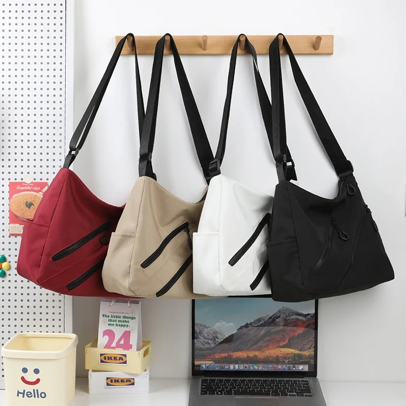 Bolso de lona para mujer de gran capacidad 2024, nuevo nicho de otoño e invierno, bolso de un solo hombro tipo bandolera, bolso de bola de masa para ir al trabajo