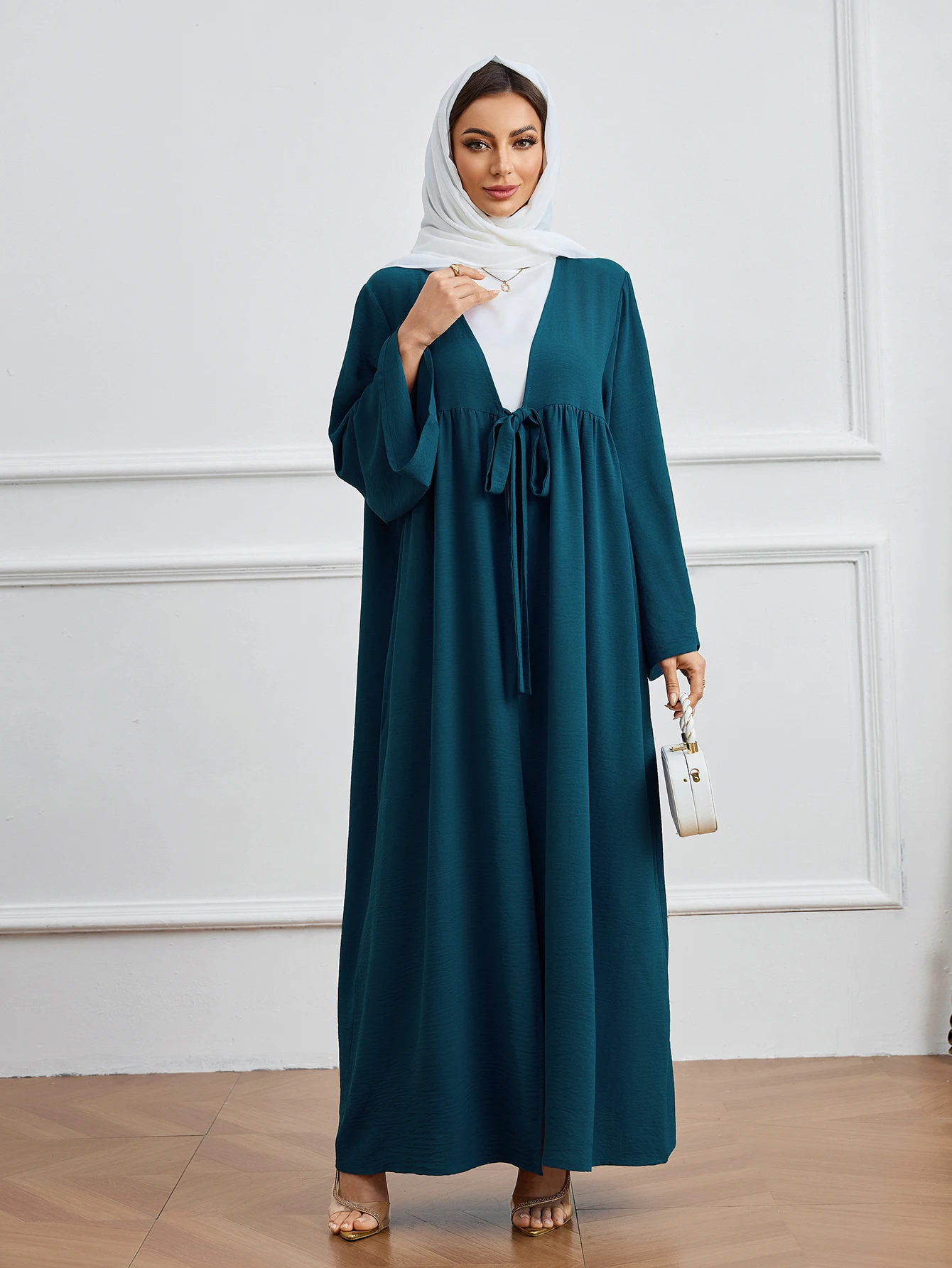 

Muslim Islamic Abaya for Women – Teal Belted Design with Loose Sleeves, Ideal for UAE, Saudi Arabia Qatar and Middle East Market