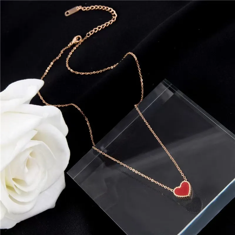 Double-sided heart-shaped love pendant titanium steel necklace female plated 18K rose gold collarbone chain fashion hundred with