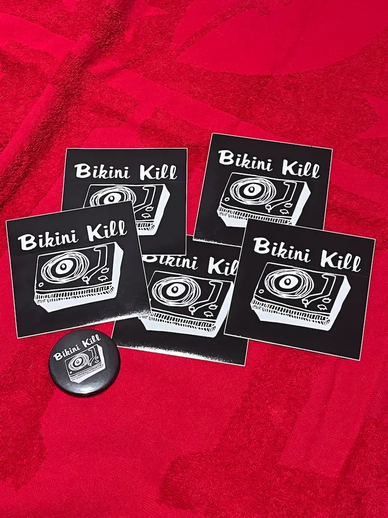 Bikini Kill T-shirt + 5 stickers + pin