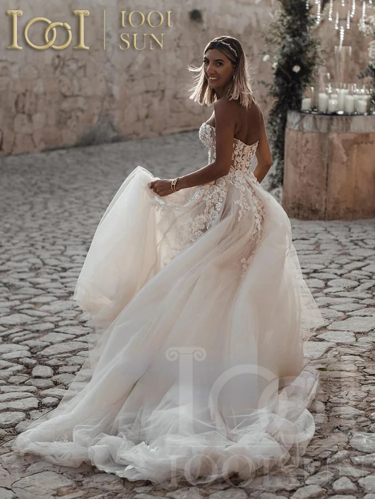 IOOISUN Boho Breathtaking Strapless Wedding Dress Featuring Stunning Lace Appliques and Flowy A-Line Bridal Dress Customized