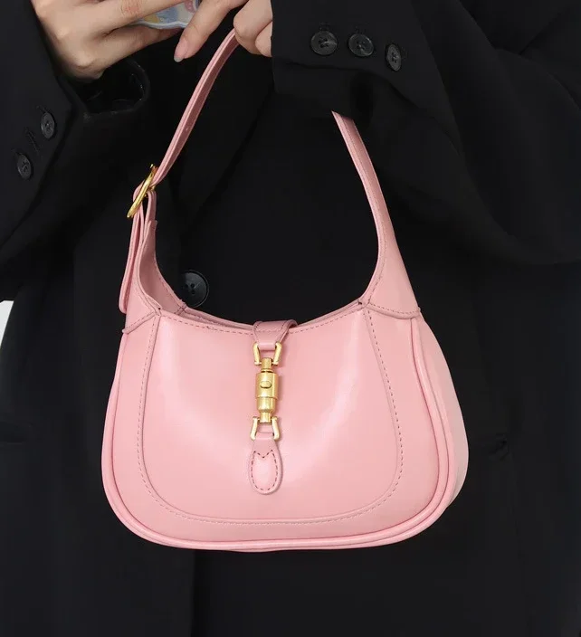 1961 retro horse bit buckle mini French underarm bag women spring and summer new texture niche saddle crossbody bag