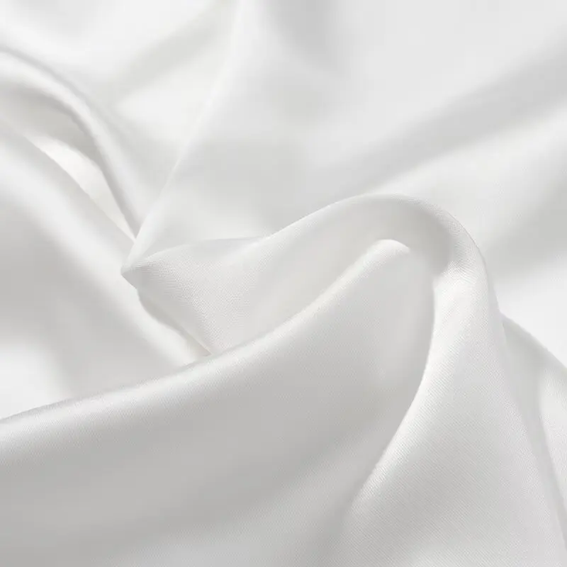 ชุดเดรสยาวทรงเข้ารูปสีขาวจีบระบายสไตล์ชิคสำหรับผู้หญิง แบรนด์ KONDALA เหมาะสำหรับใส่ไปเที่ยวทะเล โชว์หลังเปลือย สายเดี่ยว แฟชั่นฤดูร้อนปี 2025 ดีไซน์หรูหรา