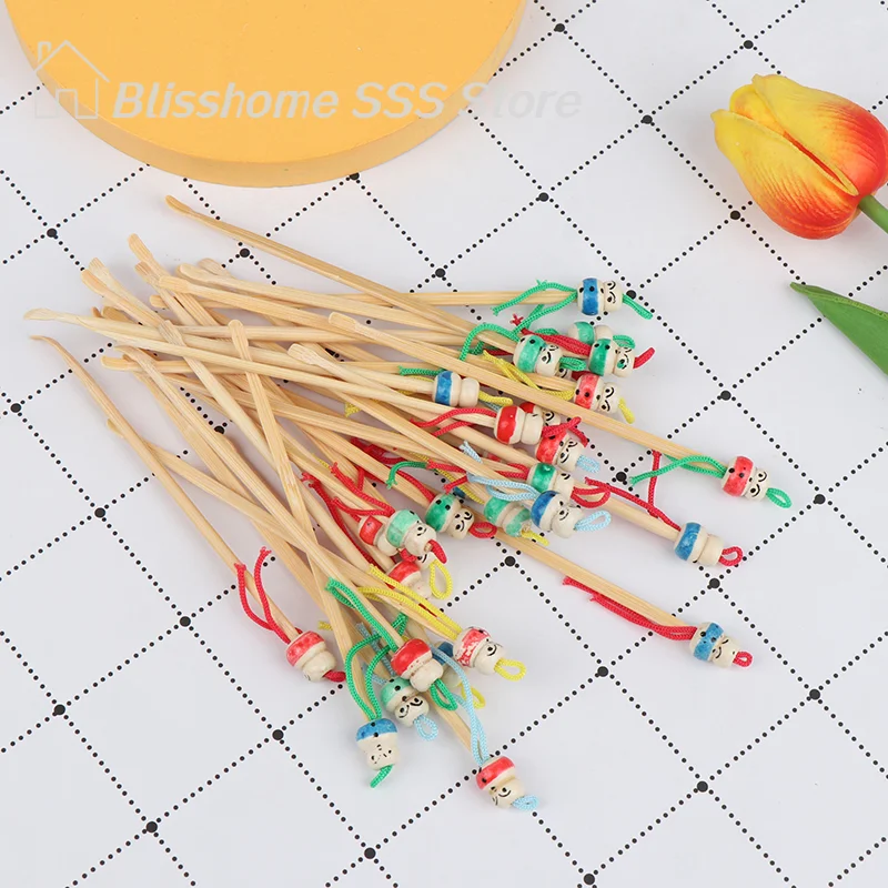 【S】10pcs/lot Cartoons Cute Mini Doll Ear Picks Wood Bamboo Picks Wax Remover Cleaner Care Tool Random Color Hot Selling