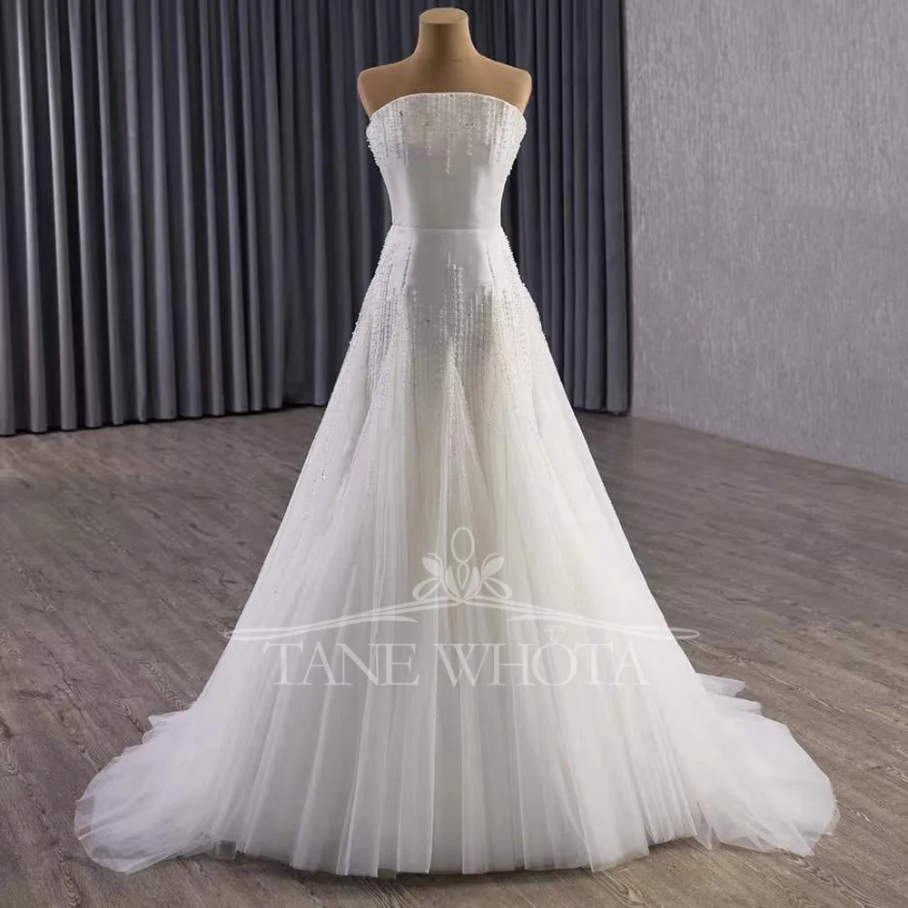 

Настраиваемое сексуальное свадебное платье Bruiloftsjurk без бретелек без рукавов со шнуровкой сзади и бисером для невест