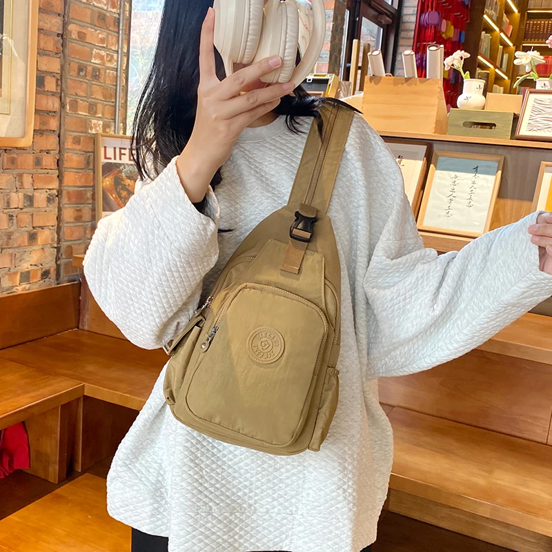 

Fashionable Lightweight Nylon Canvas Backpack Women's Travel Bag Multi-Functional Dual Shoulder Bag Casual Simple Style Backpack