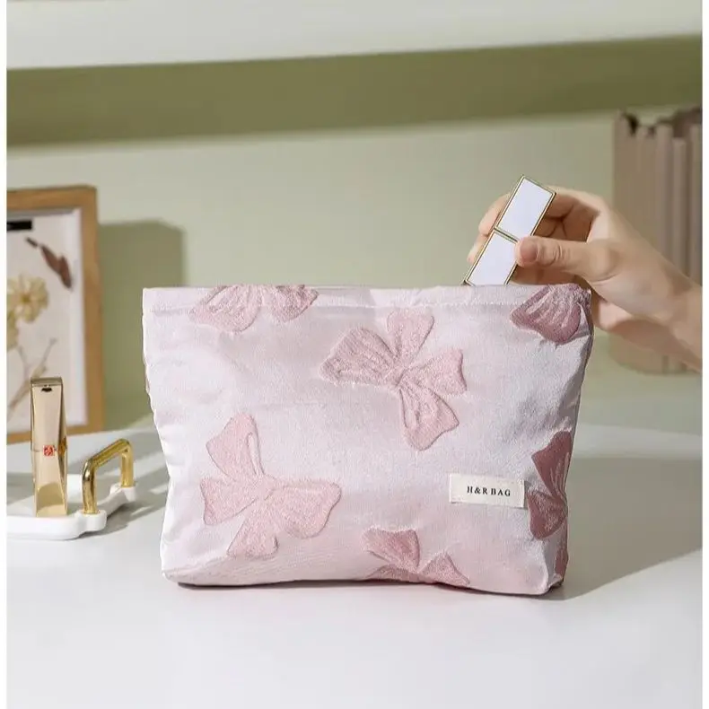 Bolsa de maquillaje con lazo rosa para mujer, bolso de almacenamiento de cojín de lápiz labial de gran capacidad, bolso de mano práctico para viaje, neceser de aseo