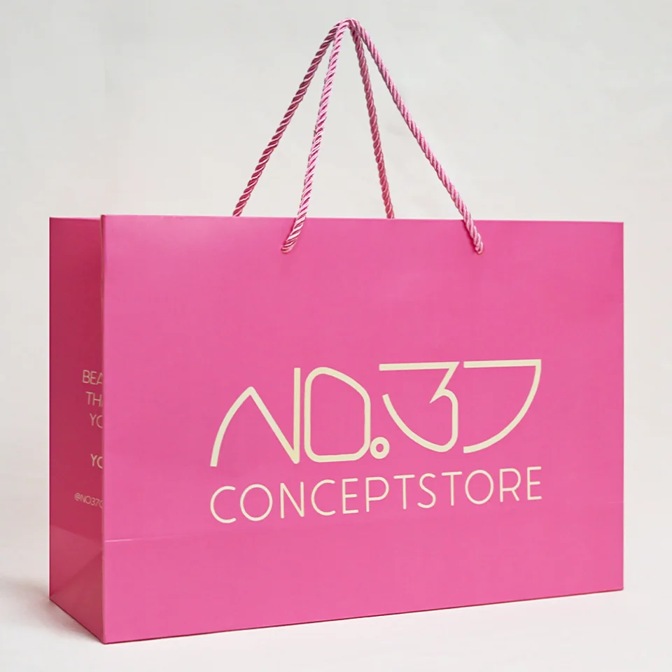 Luxury custom your own logo shopping paper bag for clothes pink matte clothing boutique packaging bags with ribbon handles