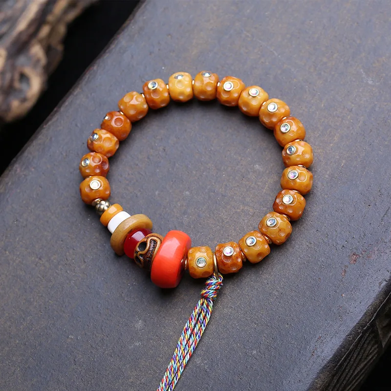 Tibetan-Style Single-Loop Bracelet With Tassels, Yak Bone Beads, And Coral Accessories
