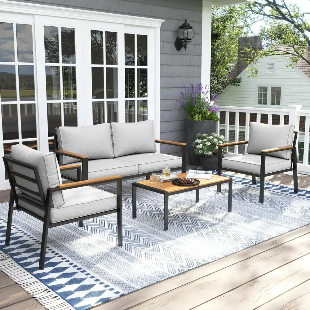 

4-Piece Outdoor Metal Patio Furniture Set with Coffee Table and Light Grey Cushions