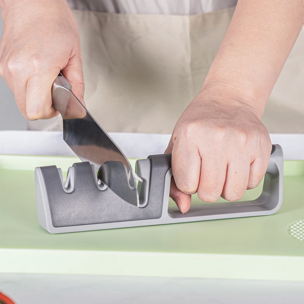 Three stage knife sharpener for repairing, restoring, and polishing blades, kitchen tools, and coarse and fine grinding