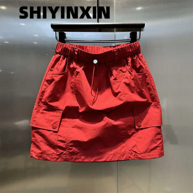 2024 Summer Women's Casual Fashion Elegant Commuting Solid Color Pocket Drawstring Elastic Waist A-line Half body Bag Hip Skirt