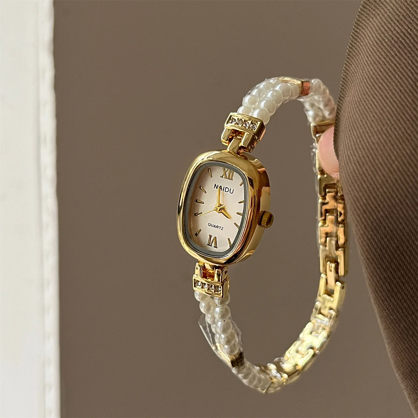New pearl-patterned oval dial women's watch, simple and stylish quartz watch, high-end selection, women's gift, ladies' present.
