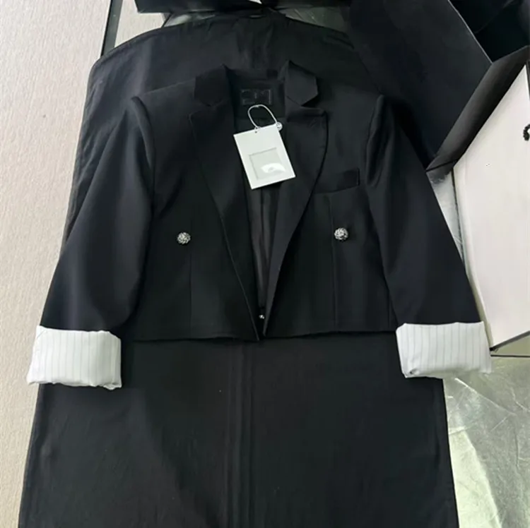 

Customization European women's clothing - new styles for summer 2026 Long-sleeved black coat with slit skirt set