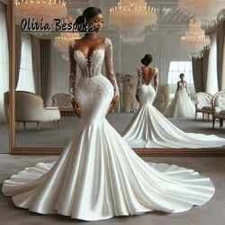 Mysterious Long Sleeves Luxury Wedding Dresses 2025 Aso Ebi Style Beaded Lace Appliques African Mermaid Illusion Customized