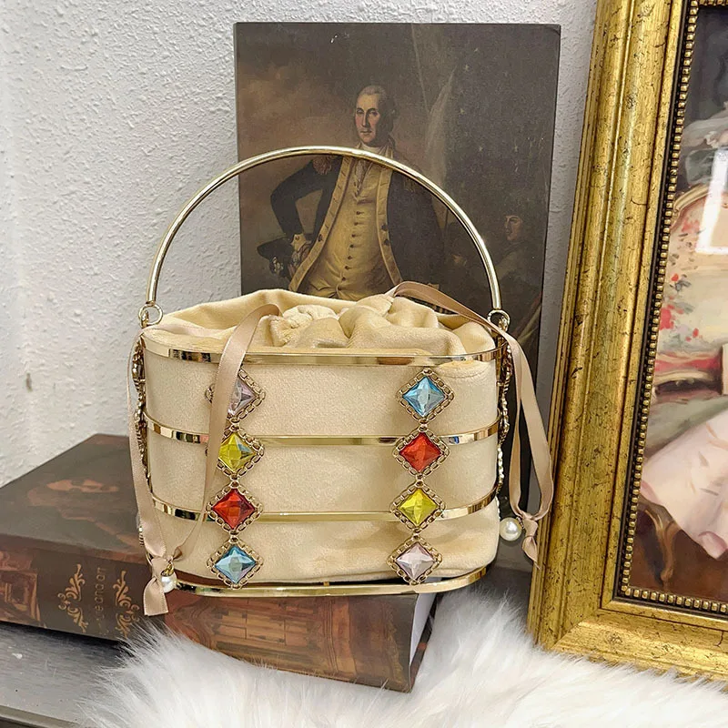 

Metal hollow diamond-encrusted colored diamond handbag hand carry evening bag light luxury bird cage bucket dinner bag