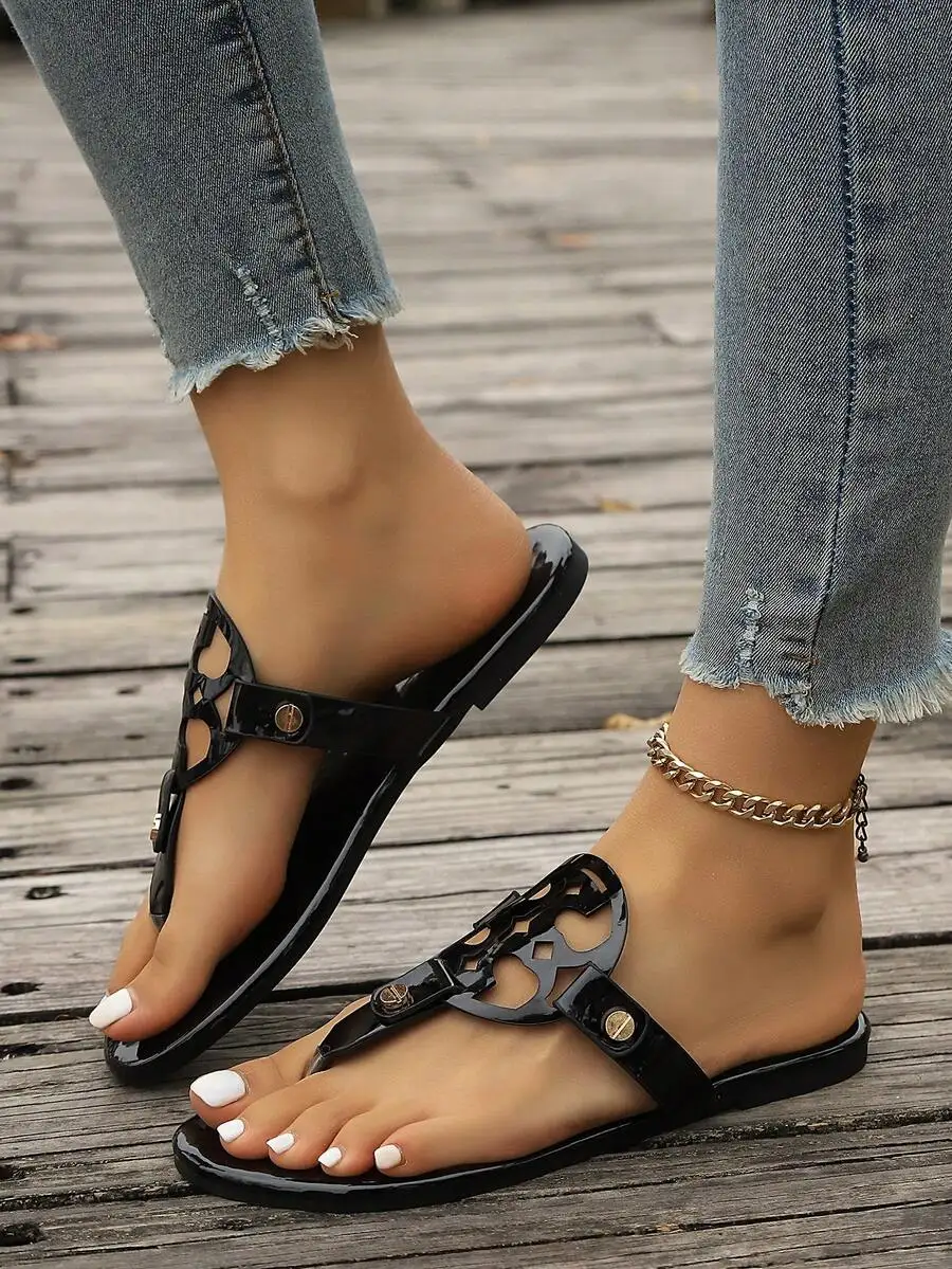 

Womens Glossy Black Flat T-Strap Sandals With Cutout Design Casual Slip-On Summer Beach Footwear
