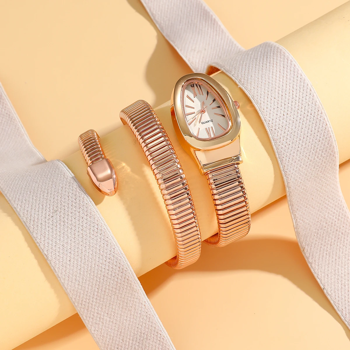 

Элегантные женские часы-браслет из розового золота с эластичным ремешком, белым циферблатом и овальной формой, идеальный подарок для нее, идеально подходят для повседневного ношения.