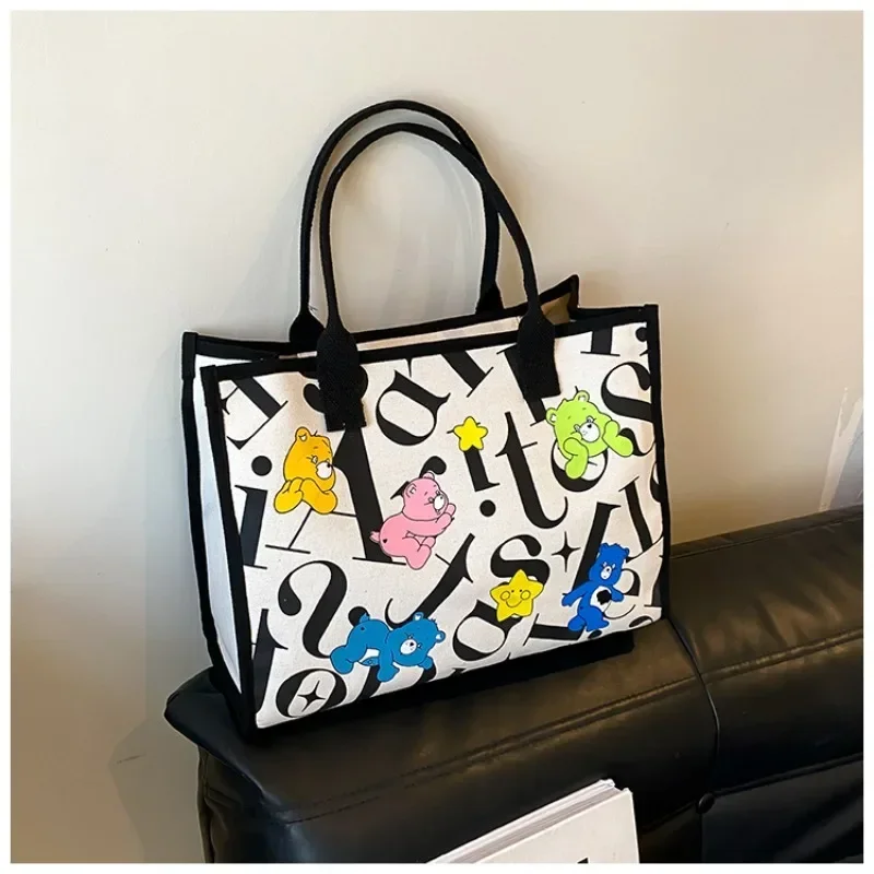 2024 New Versatile Printed Cartoon Letter Shoulder Bag Casual Canvas Tote Bag for Women Large Capacity Commuter Mommy Outing Bag