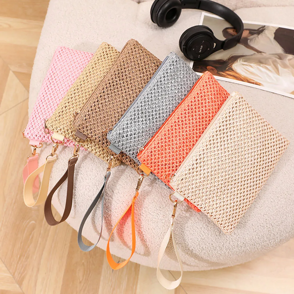 Neue stroh gewebte Handtasche Frauen böhmische Brieftasche Taschen aushöhlen gestrickte Strand tasche Retro einfarbige Armband Taschen Geldbörse