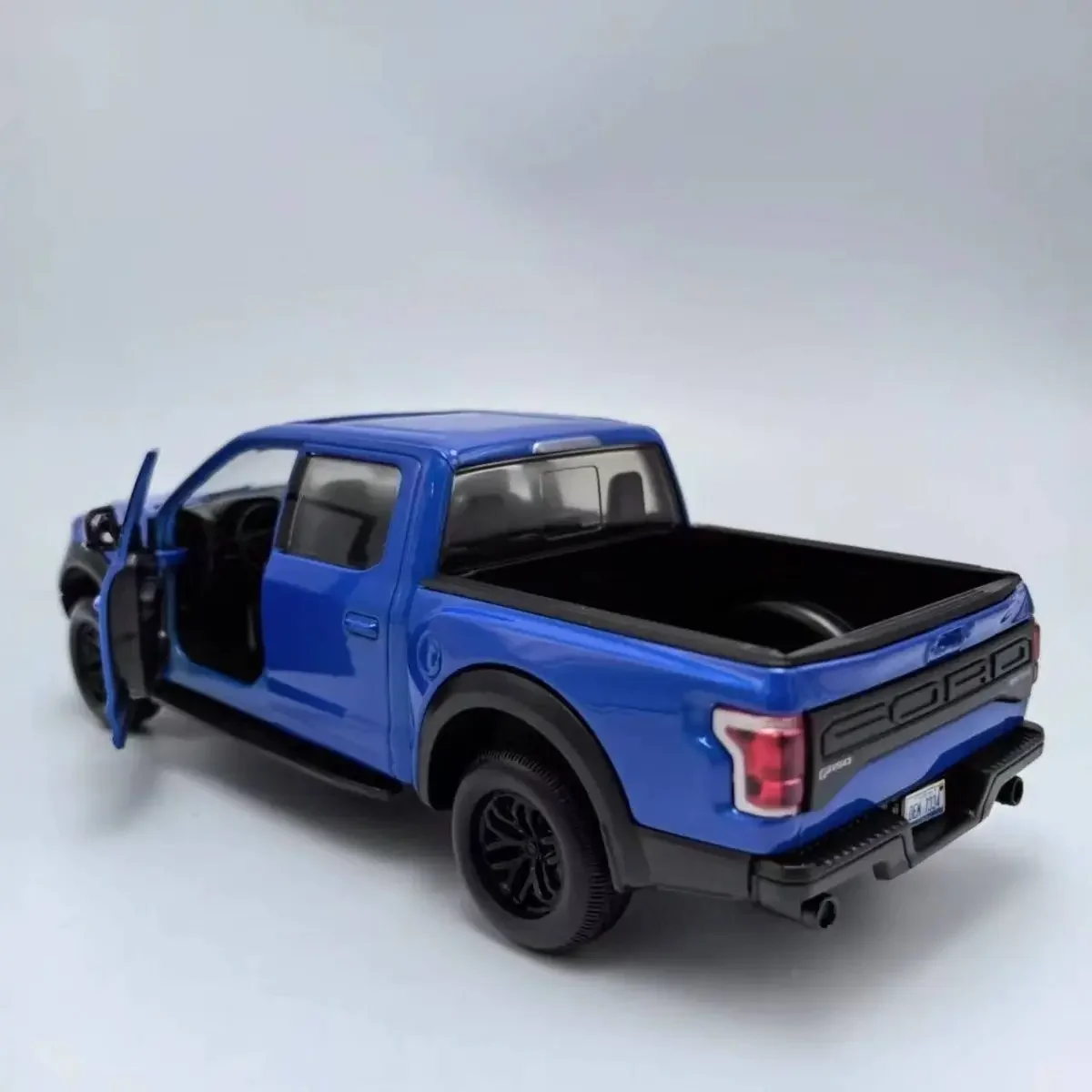 Nuovo 1:27 Ford F150 Raptor 2017 pressofusi per auto in lega e veicoli giocattolo modello di auto modello in scala in miniatura giocattoli per auto