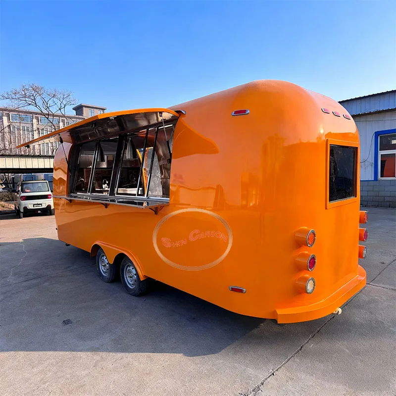 مقطورة طعام خارجية برتقالية لامعة بتصميم مزدوج العجلات لسهولة مواقف السيارات وخدمة الطعام المتنقلة #3