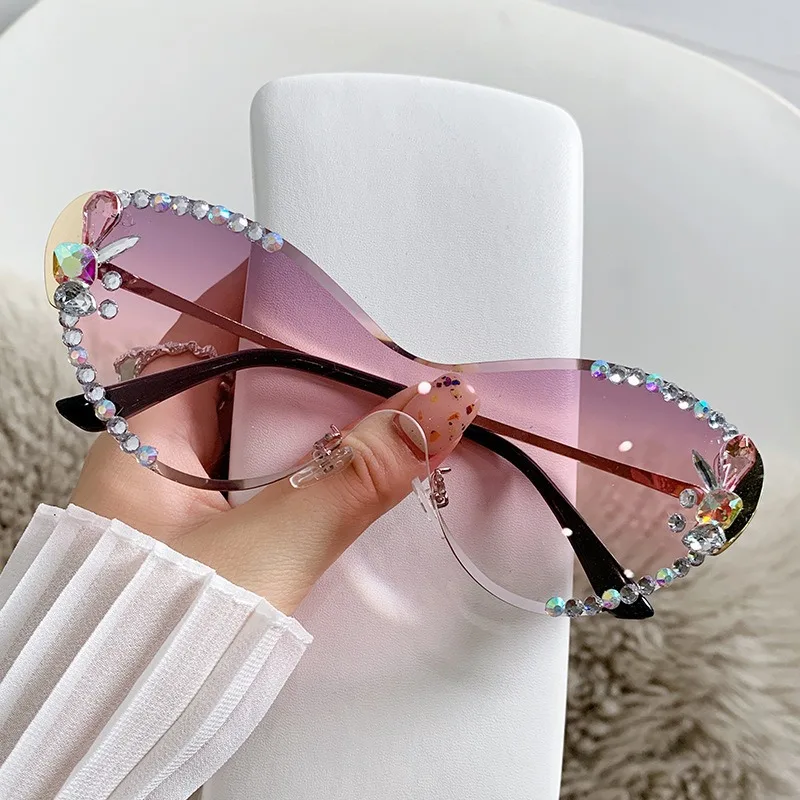 2025 New Fashionable Cat Eye Metal Inlaid Diamond Sunglasses Personalized Frameless Cutting Edge Women's Sunglasses