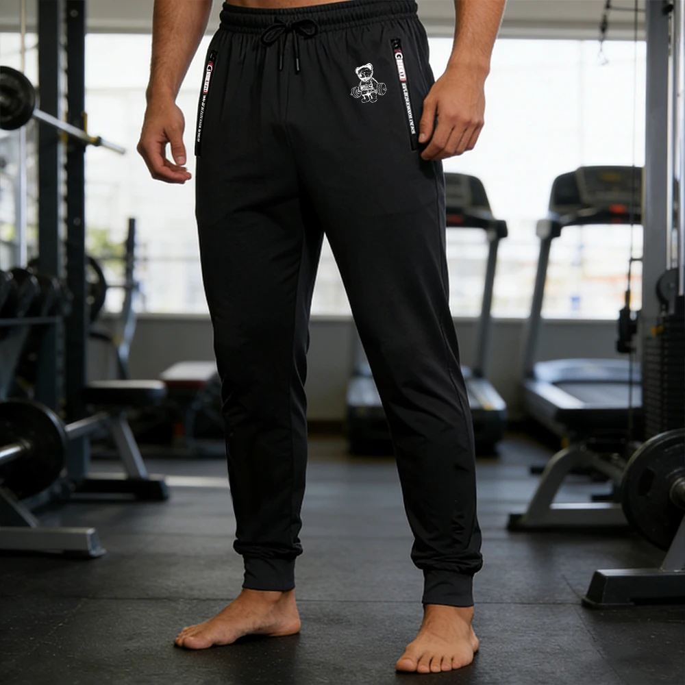 

Men's Ice Silk Casual Pants Elastic Waist Drawstring Quick Dry Lightweight Trousers Cartoon Gym Bear Print & Zipper Pockets