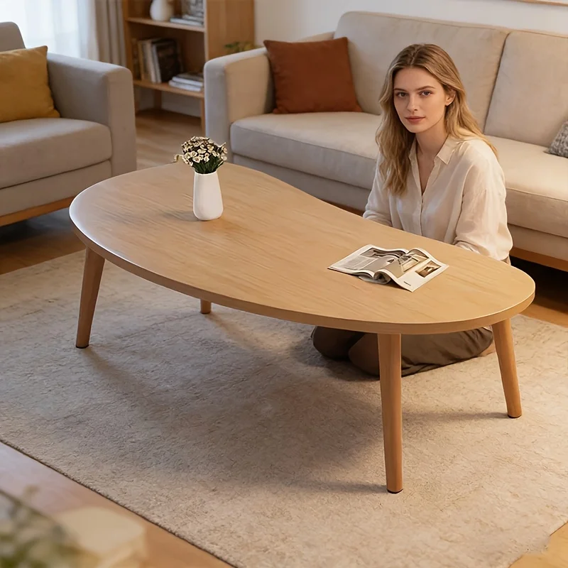 Natural Wood Grain Oval Coffee Table, Irregular Solid Wood Top Shows Unique Beauty. Slim Legs Create Lightweight Visual