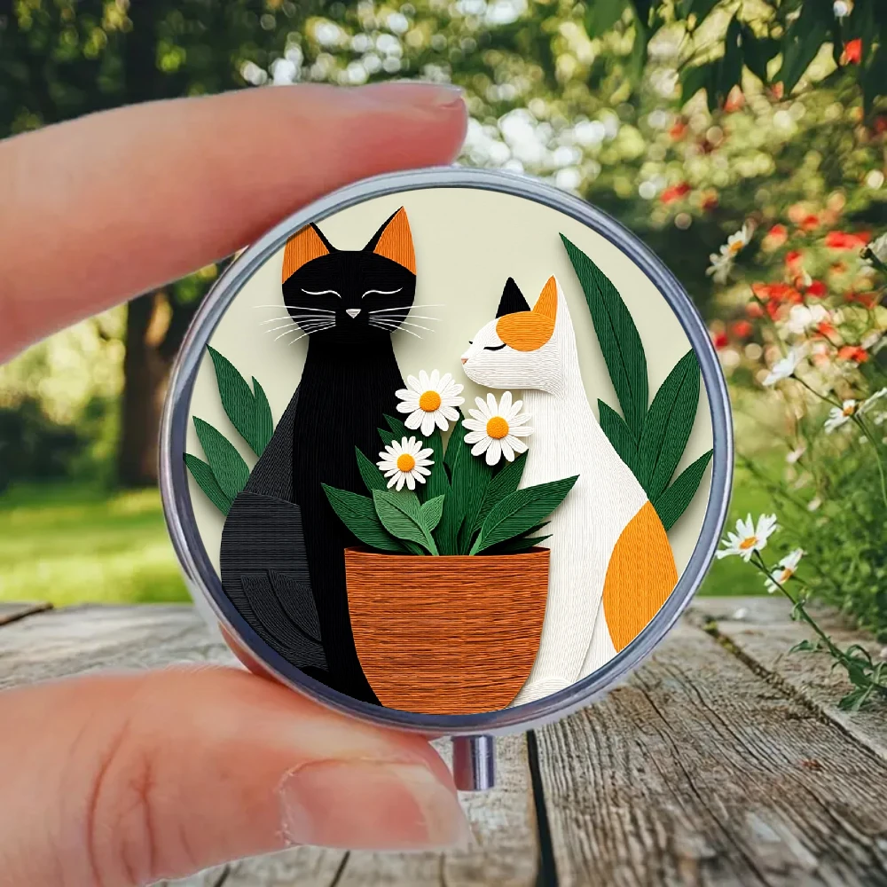 1 Flat Medicine Box with a Black and White Cat, Daisy, and Green Leaf Design. It Has Three Compartments, Is Portable, Safe, and Can Be Placed in a Wallet or Purse.