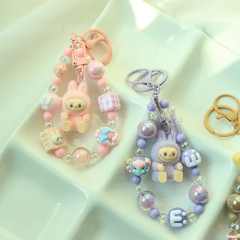 Cute Labubu resin figurine keychain cartoon POP Mart phone chain creative DIY couple friend Pendant bag decoration accessories