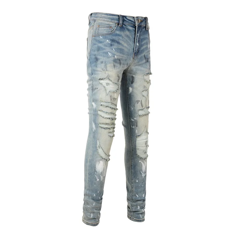 Jeans in Denim elasticizzato strappati con fori da uomo Streetwear pantaloni affusolati Skinny dipinti in difficoltà pantaloni Vintage