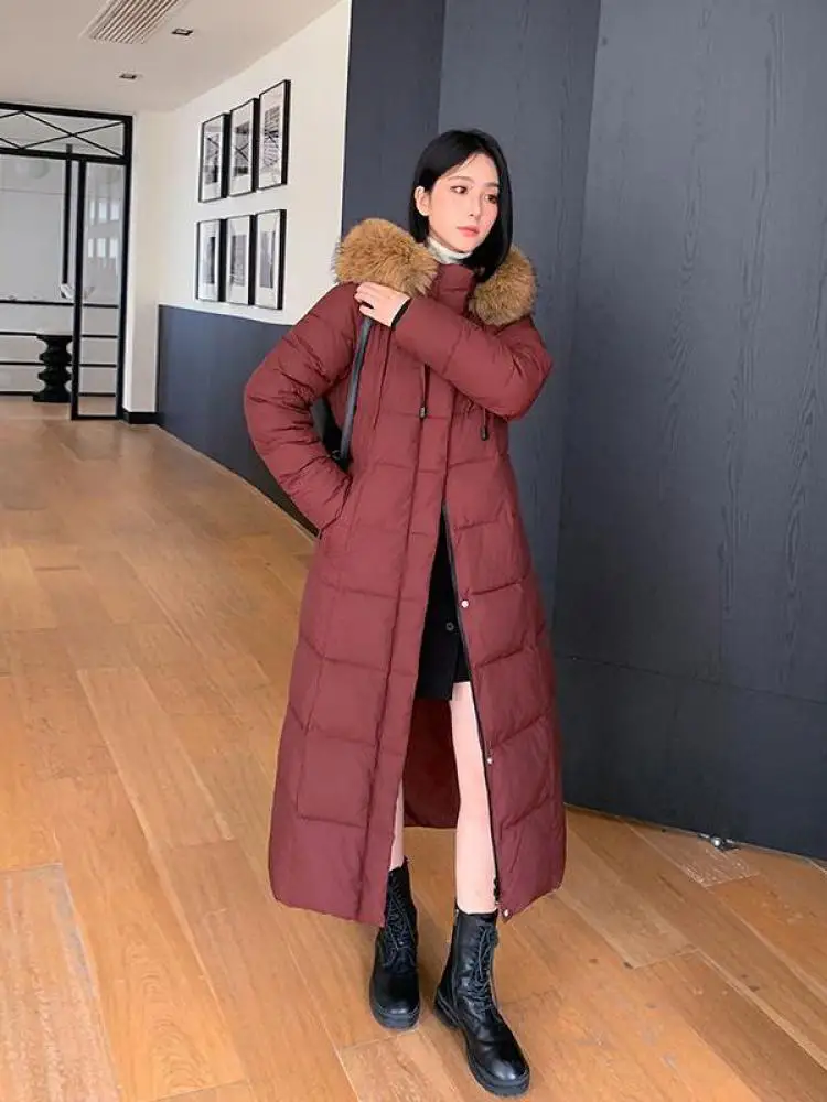 韓国の冬のファッション新しい固体毛皮のようなフード付きロングダウンコットンコート女性厚いパーカーカジュアルルーズシングルブレストオーバーコートシック