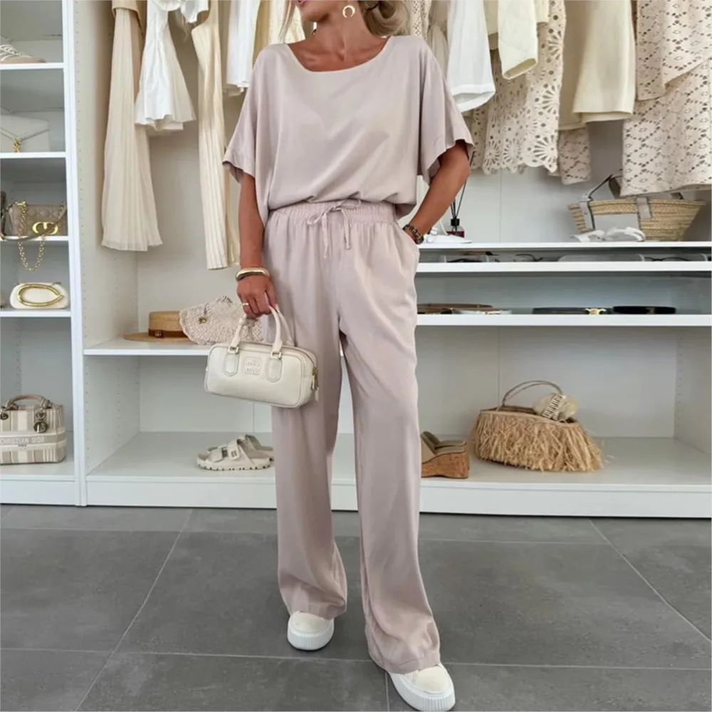 Estate Nuovo Casual O Collo a maniche corte Pantaloni lunghi da donna Set Moda Lace-up Allentato Pantaloni lunghi a gamba larga Ufficio femminile Set da 2 pezzi