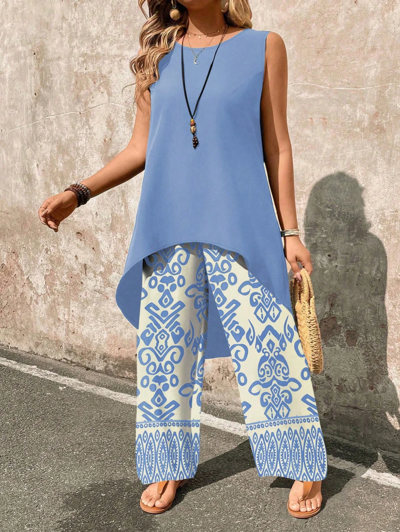 

Solid Color Round Neck Long Sleeveless Top And Wide Leg Pants Casual Boho Set