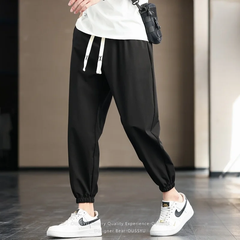 2026 New Summer Thin Ankle Length Tapered Casual Pants Men Baggy Elastic Waist Drawstring Korean Grey Green Harlan Trousers Man view 2