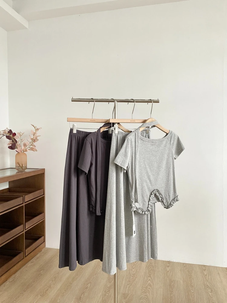 Summer new Korean style fashionable versatile design sense niche irregular hem T-shirt+long skirt solid color two piece set