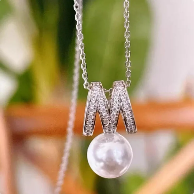 

Extra large and exquisite AAAAA natural 10-11 mm South China Sea white round pearl 925 silver earrings